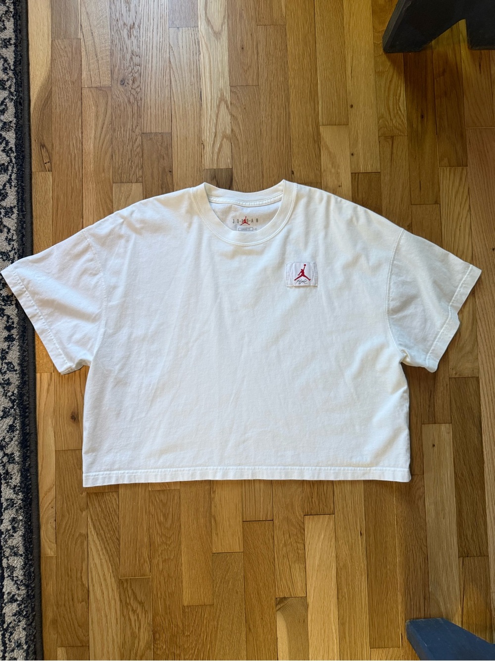 JORDAN cropped tee. Women’s SIZE LARGE. Could easily fit XL. New condition.